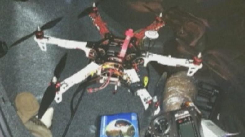 A prison lieutenant says he caught four men from metro Atlanta flying contraband into a south Georgia prison.