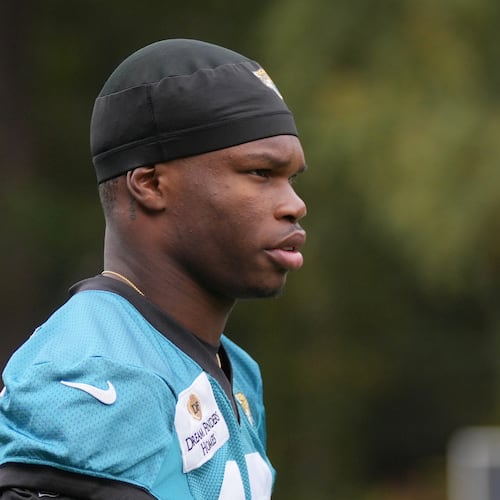 Jacksonville Jaguars wide receiver Travis Hunter (12), attends an NFL football practice at The Grove in Watford, England, Friday, Oct. 17, 2025. (AP Photo/Kin Cheung)