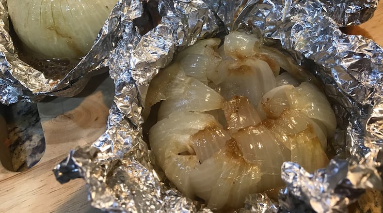 Take advantage of in-season Vidalia onions to prepare baked onions that taste like French onion soup. LIGAYA FIGUERAS / LIGAYA.FIGUERAS@AJC.COM