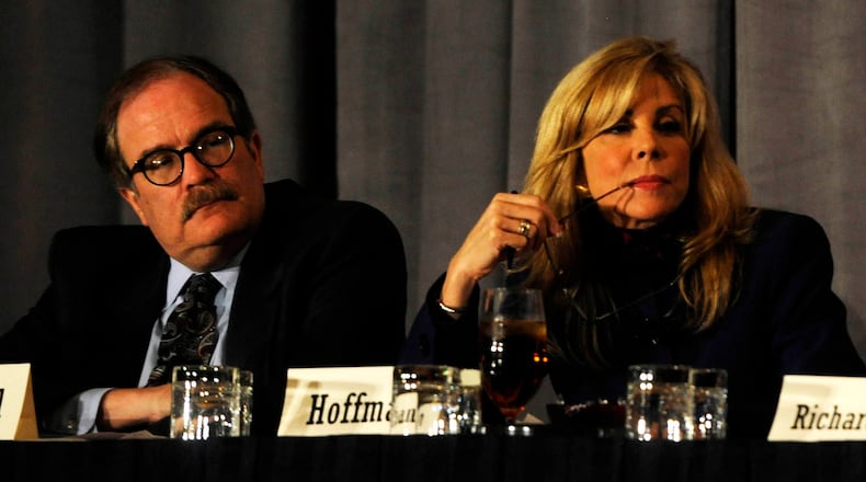 Tom Crawford, left, on a gubernatorial debate panel in 2009. AJC file
