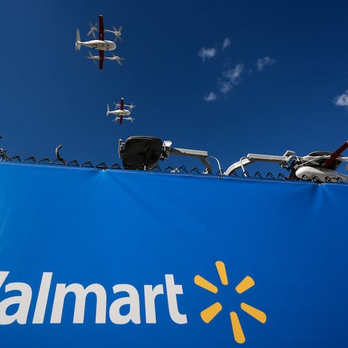Drones operated by Zipline leave base to make deliveries from a Walmart store in Pea Ridge, Ark., Friday, Sept. 26, 2025. (AP Photo/Charlie Riedel)