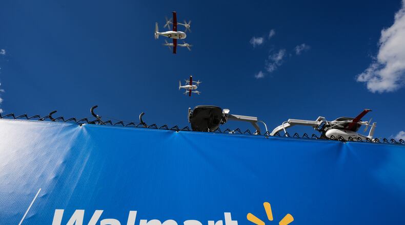 Drones operated by Zipline leave base to make deliveries from a Walmart store in Pea Ridge, Ark., Friday, Sept. 26, 2025. (AP Photo/Charlie Riedel)