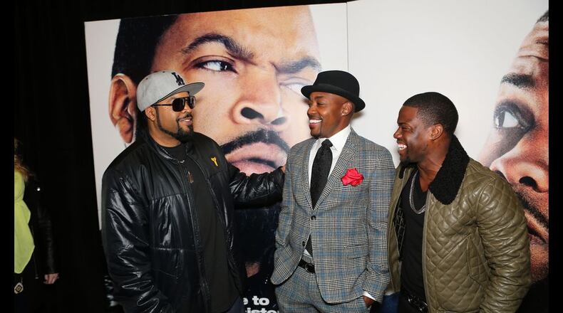Ice Cube, left, shown with Will Packer and Kevin Hart at the Atlanta premiere of "Ride Along." AJC file photo