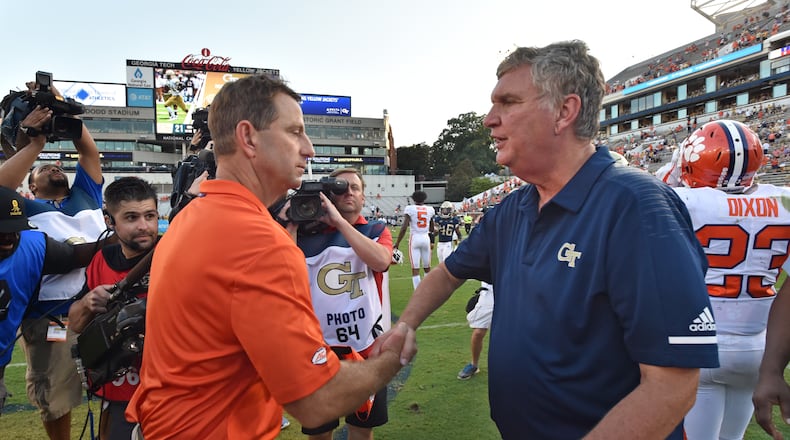 Clemson head coach Dabo Swinney and Georgia Tech head coach Paul Johnson shake hands after Clemson won 49-21 in the second half at Bobby Dodd Stadium on Saturday, September 22, 2018. HYOSUB SHIN / HSHIN@AJC.COM