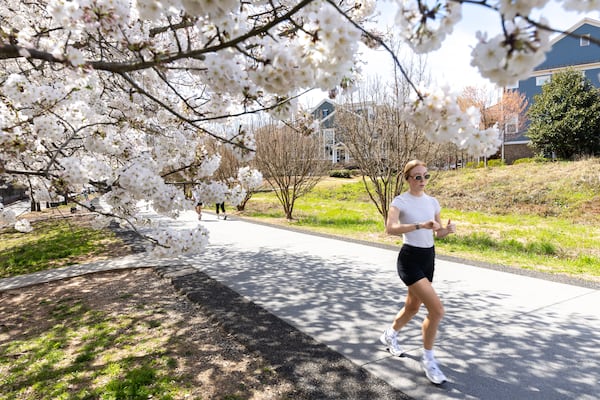 A person jogs on the Beltline by Inman Park in Atlanta on Wednesday, March 19, 2025. (Arvin Temkar/AJC)