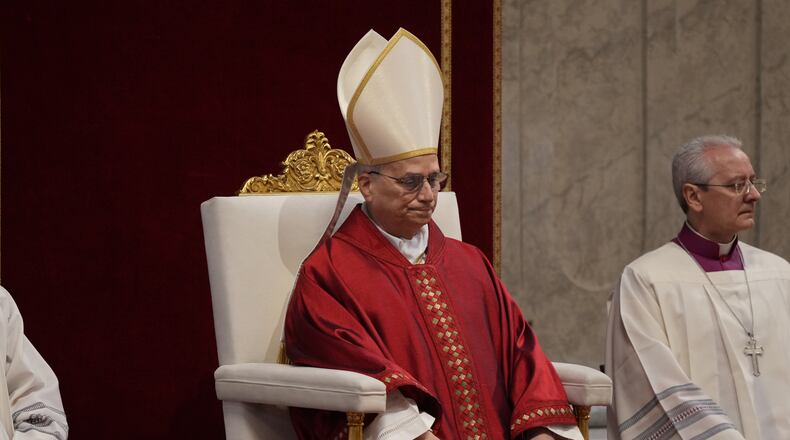 Pope Leo XIV attends the Celebration of the Passion of the Lord in St. Peter's Basilica at the Vatican on Catholic Good Friday, Friday, April 3, 2026 (AP Photo/Andrew Medichini)
