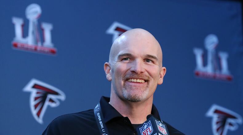 Falcons coach Dan Quinn holds his Super Bowl news conference during media availability Tuesday in the Memorial City Mall ice arena in Houston. (Curtis Compton/ccompton@ajc.com)