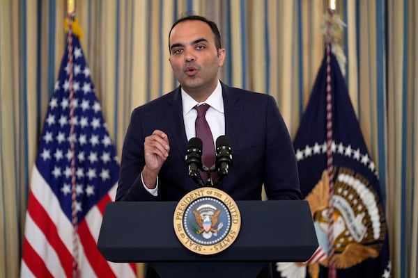 FILE - Rohit Chopra, director of the Consumer Financial Protection Bureau, speaks as President Joe Biden meets with his Competition Council to announce new actions to lower costs for families in the State Dining Room of the White House in Washington, on March 5, 2024. (AP Photo/Andrew Harnik, File)
