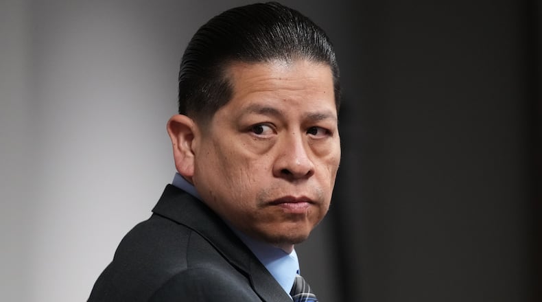 Former Uvalde school district police officer Adrian Gonzales arrives in the courtroom at the Nueces County Courthouse in Corpus Christi, Texas, Tuesday, Jan. 6, 2026. (AP Photo/Eric Gay, Pool)