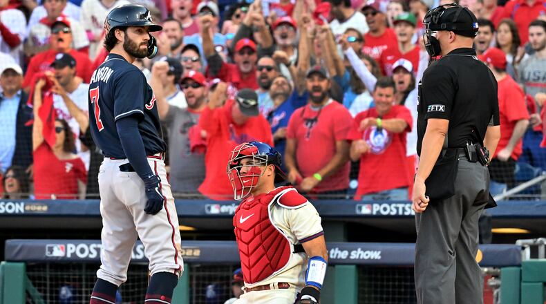 Braves shortstop Dansby Swanson (7) strikes against the Philadelphia Phillies during the sixth inning of Game 4 of the National League Division Series at Citizens Bank Park in Philadelphia on Saturday, October 15, 2022. (Hyosub Shin / Hyosub.Shin@ajc.com)