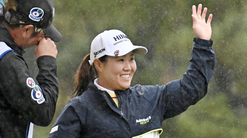 Japan's Nasa Hataoka reacts after winning the LPGA's Toto Japan Classic in Otsu, Shiga prefecture, Japan Sunday, Nov. 9, 2025. (Kyodo News via AP)