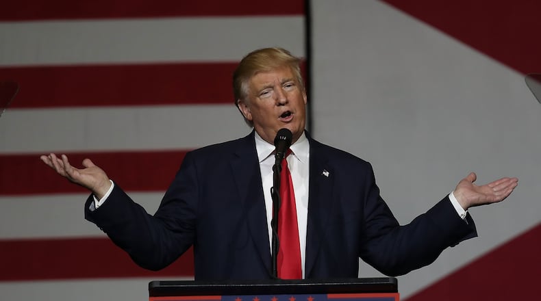 WEST PALM BEACH, FL - OCTOBER 13: Republican presidential candidate Donald Trump speaks during a campaign rally at the South Florida Fair Expo Center on Oct. 13, 2016. in West Palm Beach, Fla. In his remarks, Trump vehemently denied recent allegations of past sexual assault and railed against mainstream media corruption and the "Clinton machine." JOE RAEDLE / GETTY IMAGES