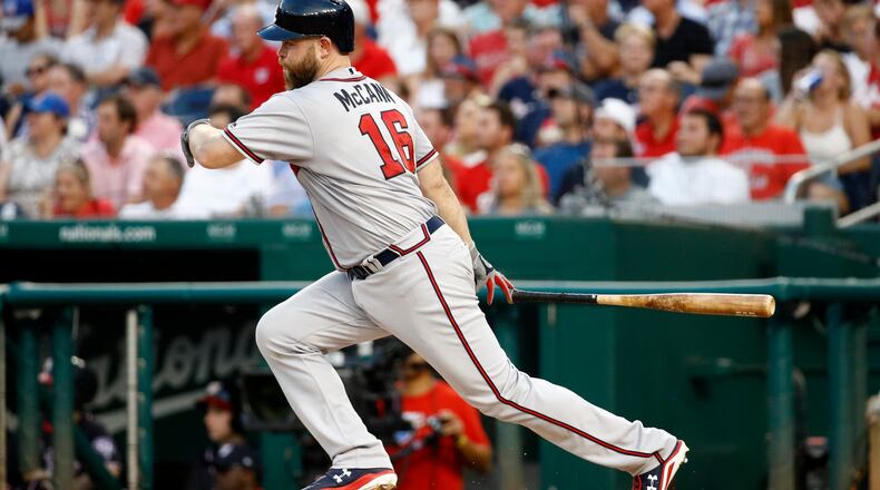 Atlanta Braves' Brian McCann heads to first with an RBI single during the third inning of the team's baseball game against the Washington Nationals, Tuesday, July 30, 2019, in Washington. (AP Photo/Patrick Semansky)