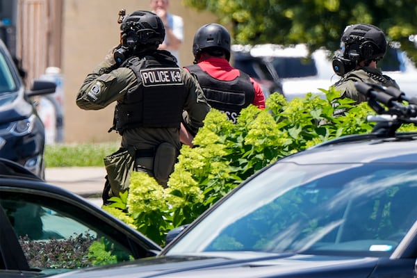Mario Guevara with MGNews is detained by Dekalb County Sheriff's depurties in Dekalb County, during a No Kings Day protest near Atlanta, on Saturday, June 14, 2025/ (AP Photo/Mike Stewart)