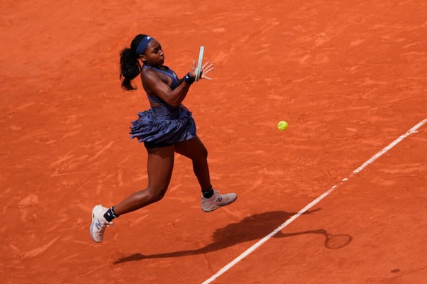 Coco Gauff of the U.S. plays a shot against Russia's Ekaterina Alexandrova during their fourth round match of the French Tennis Open at the Roland-Garros stadium in Paris, Monday, June 2, 2025. (AP Photo/Thibault Camus)