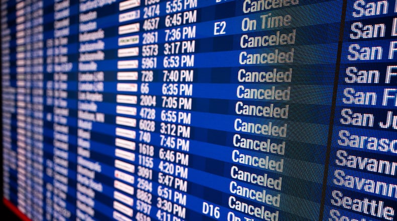 Rows of cancelled flights are displayed at the Philadelphia International Airport on Monday, Feb. 23, 2026 in Philadelphia. (AP Photo/Joe Lamberti)