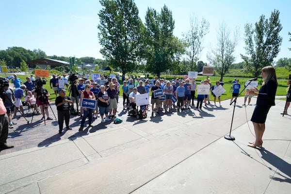 Iowa congressional candidate Sarah Trone Garriott speaks during an Iowa Democratic Party rally, Thursday, July 3, 2025, in Windsor Heights, Iowa. (AP Photo/Charlie Neibergall)