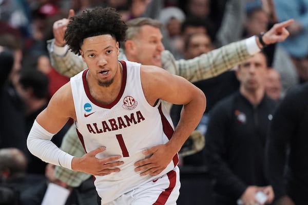 Alabama guard Mark Sears (1) reacts after making a three point basket against Brigham Young during the second half of a Sweet 16 round NCAA college basketball tournament game, Thursday, March 27, 2025, in Newark, N.J. (AP Photo/Frank Franklin II)