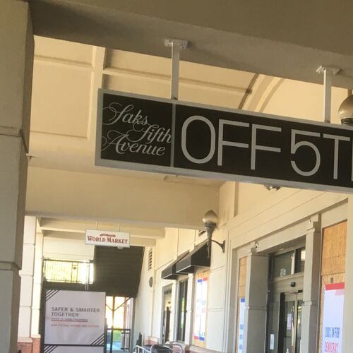 The Saks Off 5th in Buckhead will remain open after the company announced dozens of closures across the United States. (AJC file)