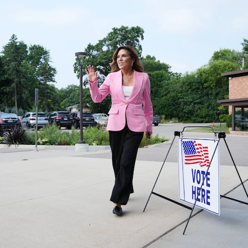Michele Tafoya, a Republican candidate for U.S. Senate, arrives to vote on Tuesday, Aug. 11, 2026, in Minneapolis. (AP Photo/Ellen Schmidt)