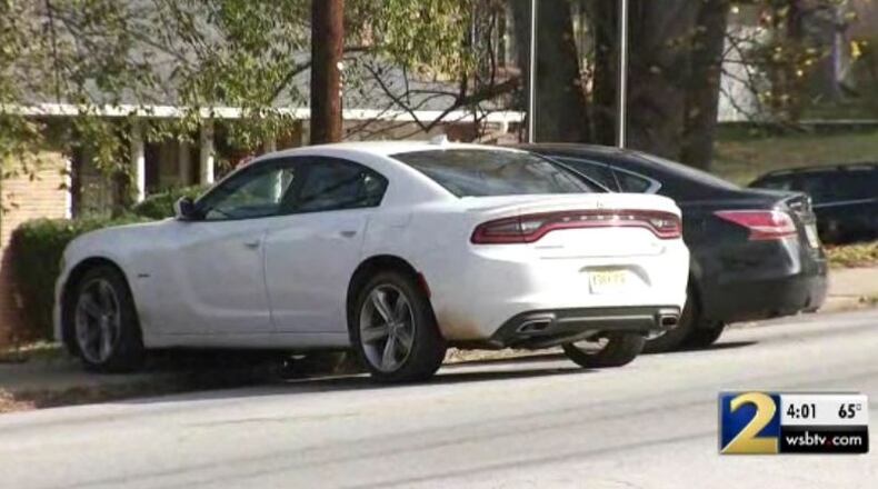 The white car on the left was involved in a shooting in DeKalb County.
