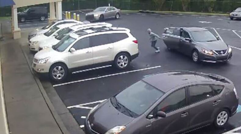 Car thieves hit a Clayton County day care center Tuesday morning. Surveillance video showed thieves emerging from a silver Nissan Altima to steal a 2016 Chrysler 300 and white 2014 Hyundai Santa Fe. Both vehicles and a child in the Hyundai were later recovered.