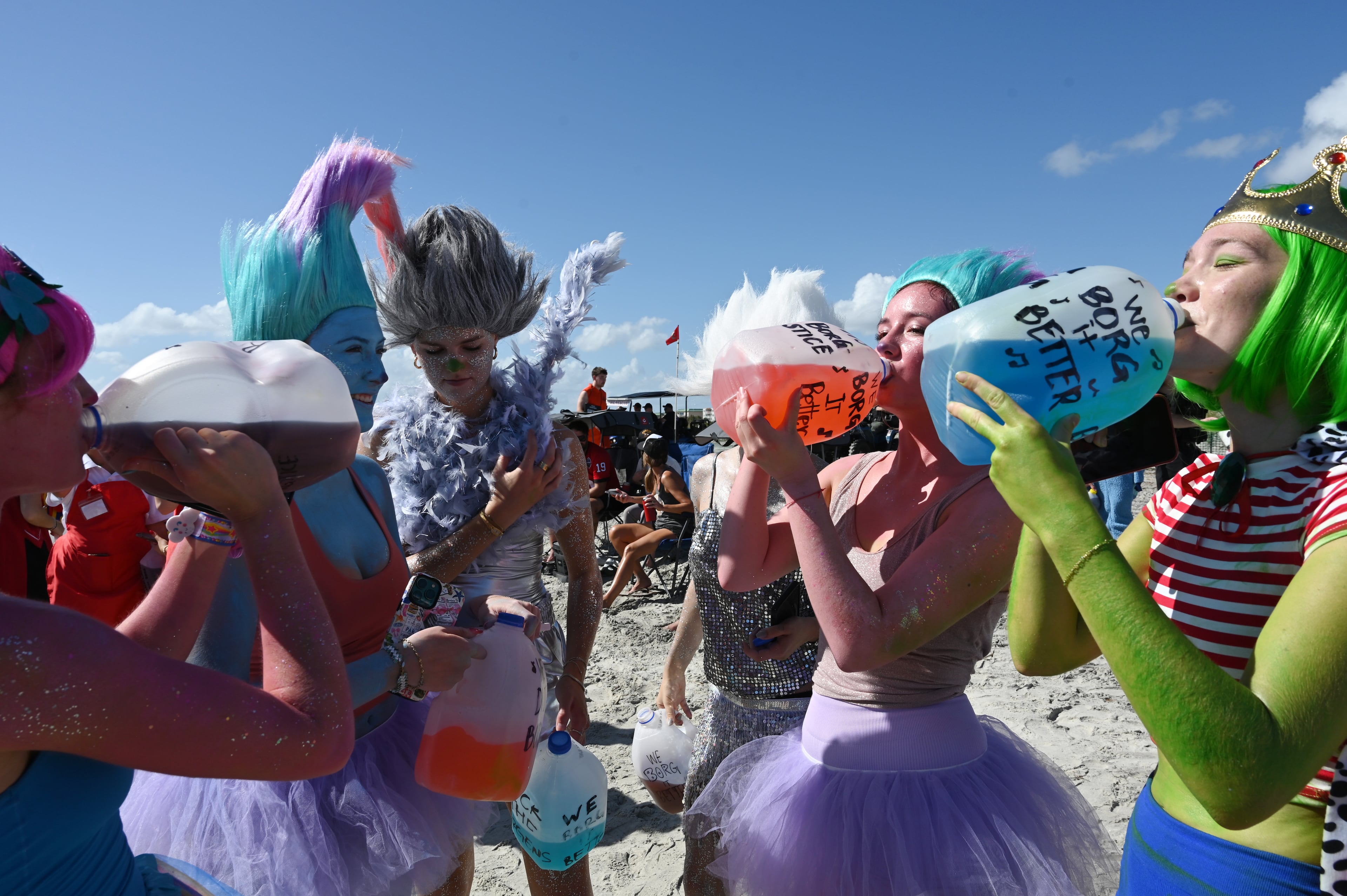 Thousands of UGA students enjoy during the annual “Frat Beach” party for the weekend of the Georgia-Florida football game on St. Simons Island, Friday, November 1, 2024. On the weekend of the Georgia-Florida football game, St. Simons Island’s East Beach becomes “Frat Beach,” an open-air party teeming with thousands of college students. (Hyosub Shin / AJC)