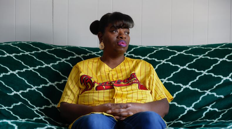 Nora Williams poses for a portrait at her daughter’s apartment where she currently lives. This year, Williams qualified for a basic cash income program that financially assists women in need in College Park. (Natrice Miller/natrice.miller@ajc.com)