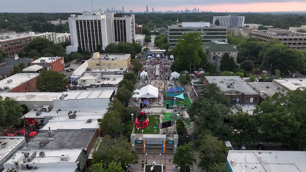 An aerial image shows attendees at Decatur Square during the Decatur Watchfest 26 listens to The War and Treaty concert on Wednesday, June 25, 2026. (Miguel Martinez/AJC)