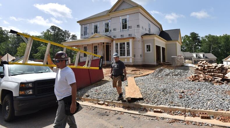 Sandy Springs has updated its community development fees for building permits, zoning actions and applications for certain types of construction. AJC FILE