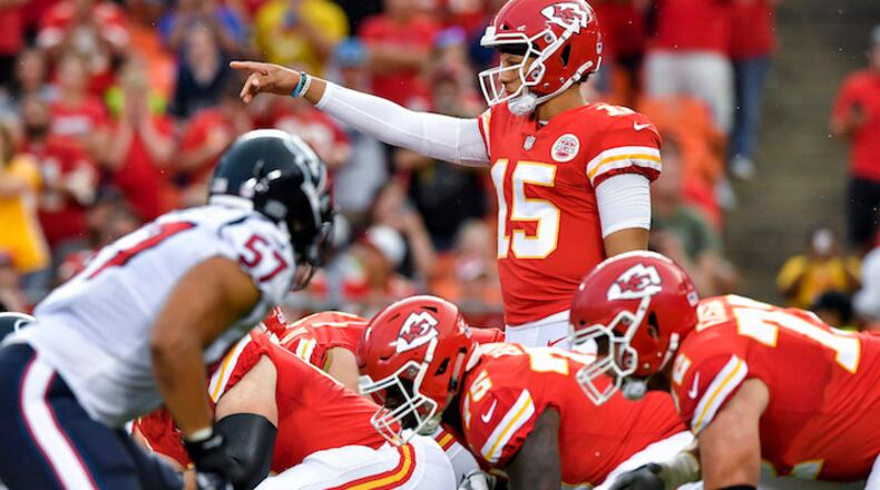 Kansas City Chiefs quarterback Patrick Mahomes directs the line on his first play of the game in the first quarter against the Houston Texans on Thursday, Aug. 9, 2018, at Arrowhead Stadium in Kansas City, Mo. (John Sleezer/Kansas City Star/TNS)