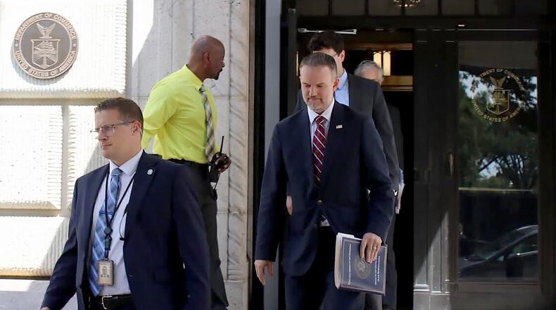 United States Trade Representative Jamieson Greer, center, leaves the U.S. Department of Commerce following a meeting with Canadian officials, in Washington, Monday, Aug. 17, 2026. (Kelly Geraldine Malone/The Canadian Press via AP)