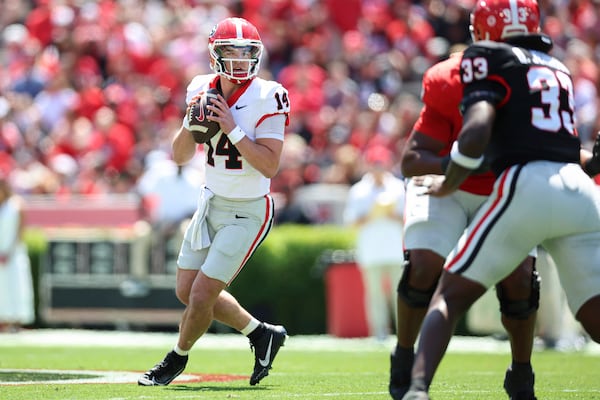 Georgia Red Team quarterback Gunner Stockton (14) looks to pass the ball during the NCAA college football team's spring game, Saturday, April 12, 2025, in Athens, Ga. (AP Photo/Colin Hubbard)