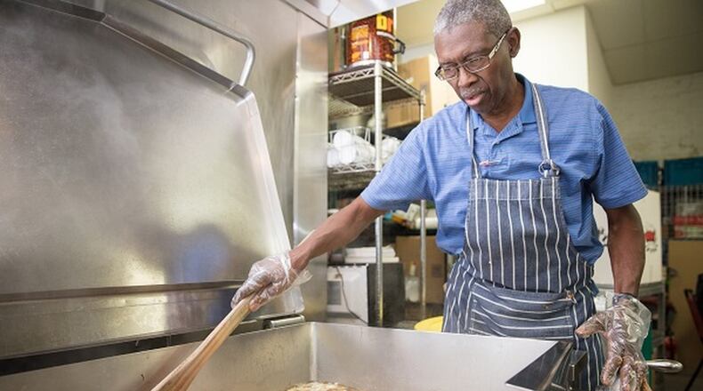 For three decades, Clyde Corbin has managed the Crossroads Community Ministries kitchen that provides food to grownups and children who are homeless. EZRA MILLSTEIN