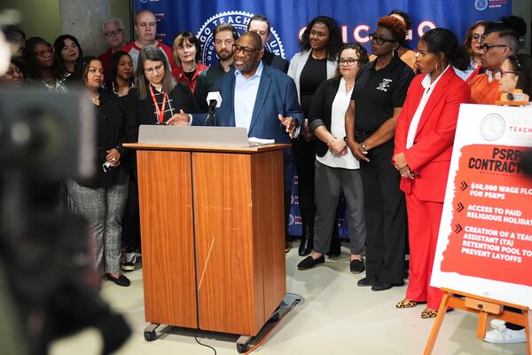 Pastor Walter Turner talks to media during news conference for Teachers Union to Announce Historic Contract Ratification Vote Results at CTU (Chicago Teachers Union) headquarters in Chicago, Monday, April 14, 2025. (AP Photo/Nam Y. Huh)