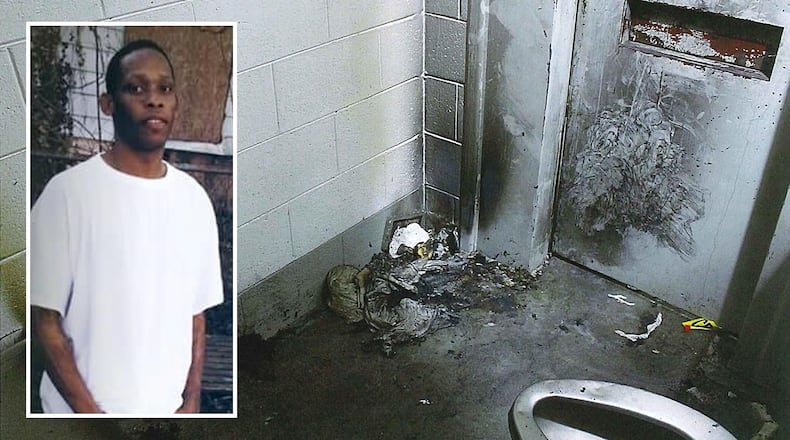 Thomas Giles (left) died after being left for more than three hours in his cell as a smoldering fire filled it with dense smoke. The flap on his door was bolted shut most of the time, concentrating the smoke. His family's attorney said that smears on the door show where Giles, his hands covered with soot, tried to get someone to let him out. (Family photo; GDC case file)