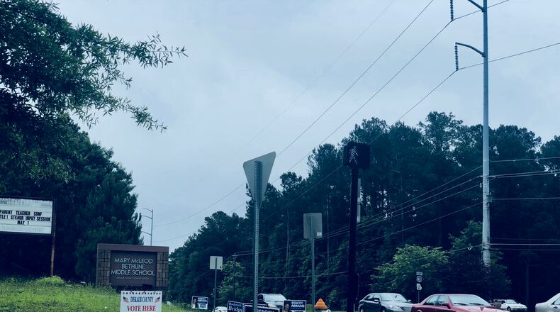 Signs direct Dekalb County voters into Mary Mcleod Bethune Middle School for Election Day.