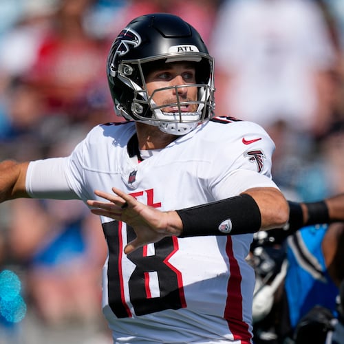 Atlanta Falcons quarterback Kirk Cousins passes against the Carolina Panthers during the second half of an NFL football game, Sunday, Sept. 21, 2025, in Charlotte, N.C. (AP Photo/Jacob Kupferman)