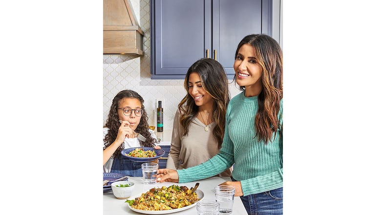 Suzy Karadsheh, author of "The Mediterranean Dish," with daughter (left to right) Hannah and Dara. /
Courtesy of Caitlin Bensel
