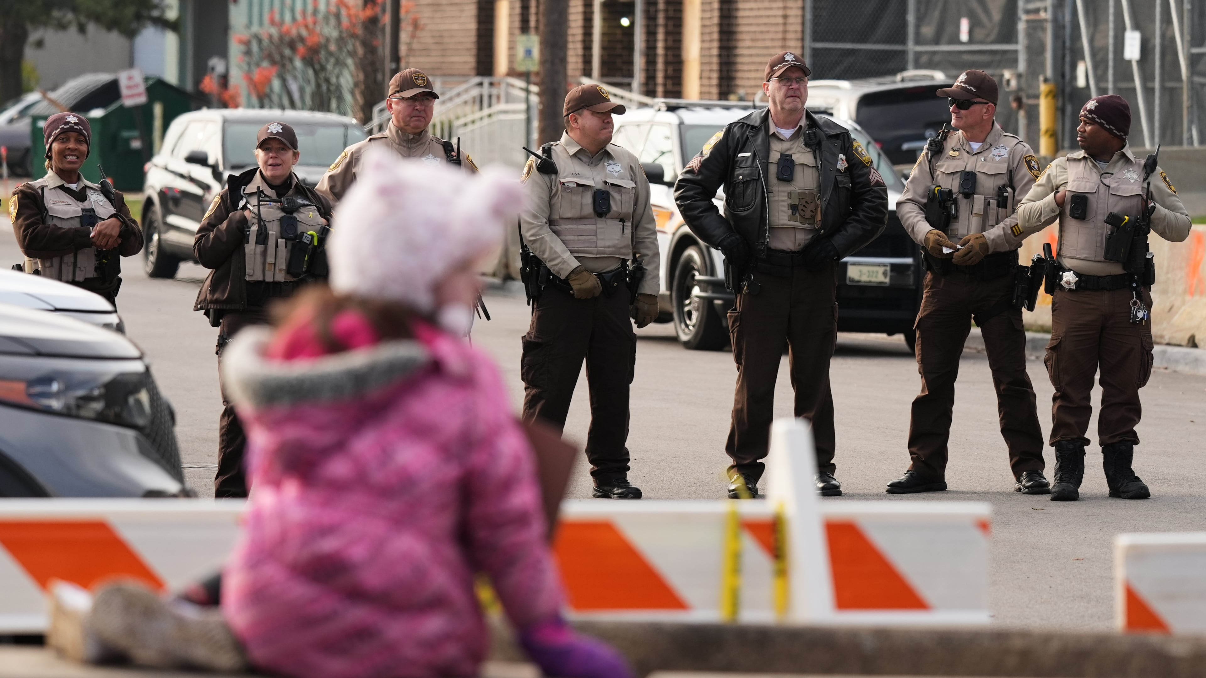 Law enforcement officers guard outside an ICE processing facility in the Chicago suburb of Broadview, Ill., Friday, Nov. 21, 2025. (AP Photo/Nam Y. Huh)