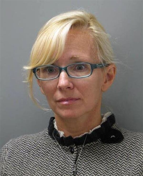 FILE - In this undated file photo provided Wednesday, Nov. 5, 2014 by the Delaware State Police, Molly Shattuck, of Baltimore, poses for a police photo. A case review for 47-year-old Shattuck had been scheduled for Wednesday, June 17, 2105, but there were no issues to bring before the judge. The final case review was scheduled for March 18. (AP Photo/Delaware State Police, File)