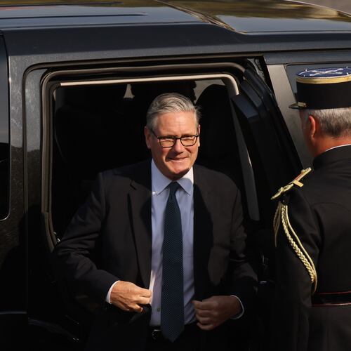 British Prime Minister Keir Starmer arrives for the Bastille Day military parade on the Champs-Elysees avenue in Paris, Tuesday, July 14, 2026. (AP Photo/Thomas Padilla)