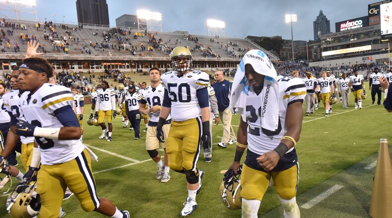 October 3, 2015 Atlanta - Georgia Tech Yellow Jackets players leave after the team lost at Bobby Dodd Stadium on Saturday, October 3, 2015. North Carolina Tar Heels won 38-31 over the Georgia Tech Yellow Jackets. HYOSUB SHIN / HSHIN@AJC.COM