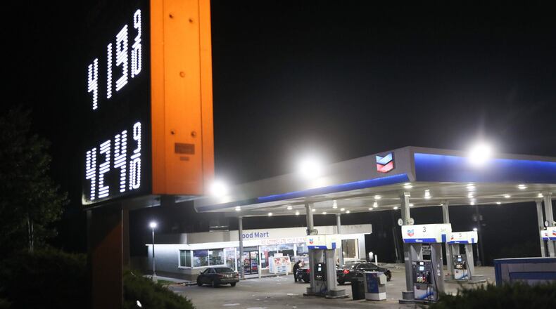 DeKalb County police are working to identify a suspect in a Wednesday morning shooting at a Chevron station on Candler Road. One man was killed, and a woman may still be in danger, Channel 2 Action News reported.