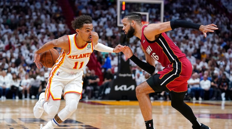 Hawks guard Trae Young (11) is eager to get back on the court next season after an early exit in the NBA playoffs. (AP Photo/Wilfredo Lee)