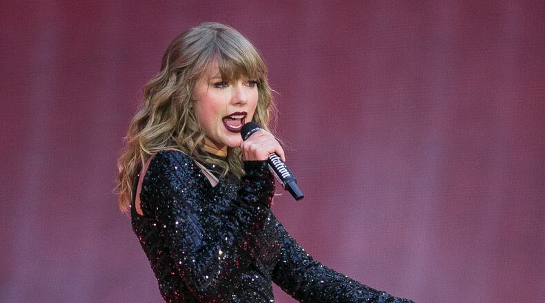 FILE - In this June 22, 2018, file photo, singer Taylor Swift performs on stage in concert at Wembley Stadium in London. Swift is canceling all of her performances and appearances for the rest of the year because of the coronavirus pandemic. âWith many events throughout the world already cancelled, and upon direction from health officials in an effort to keep fans safe and help prevent the spread of COVID-19, sadly the decision has been made to cancel all Taylor Swift live appearances and performances this year," Swiftâs representative said in a statement released Friday.  (Photo by Joel C Ryan/Invision/AP, File)