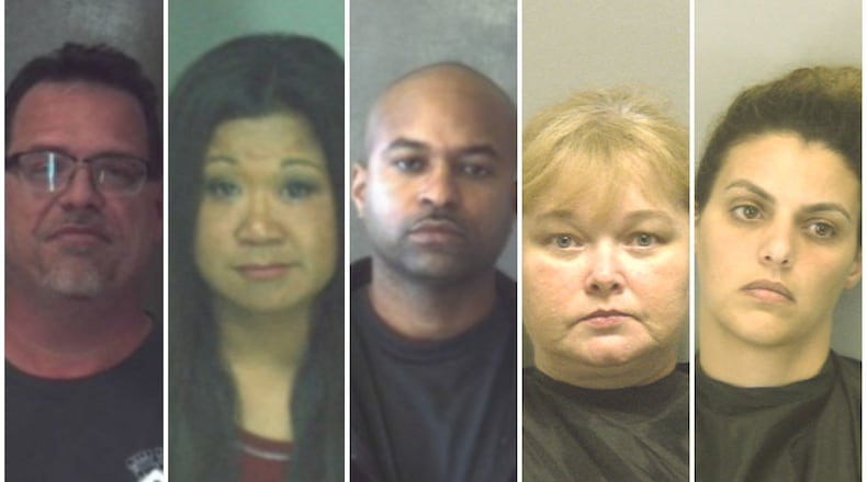 Samuel Crenshaw, left, Darliene Crenshaw, George Moore, Tara Lee Gilleo and Giovene Burkhalter were indicted Wednesday by a grand jury in DeKalb County.