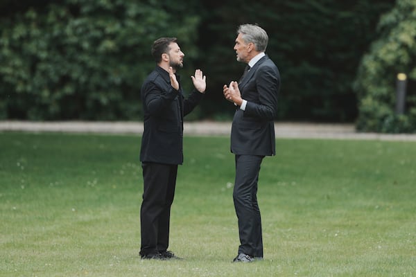 Netherland's Prime Minister Dick Schoof, right, speaks with Ukraine's President Volodymyr Zelenskyy during a meeting at the Catshuis on the sidelines of the NATO summit in The Hague, Netherlands, Tuesday, June 24, 2025. (AP Photo/Markus Schreiber)