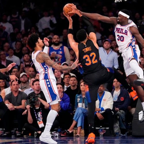 Philadelphia 76ers center Adem Bona (30) blocks New York Knicks center Karl-Anthony Towns (32) during the second half of Game 2 in a second-round NBA basketball playoffs series, Wednesday, May 6, 2026, in New York. (AP Photo/Yuki Iwamura)