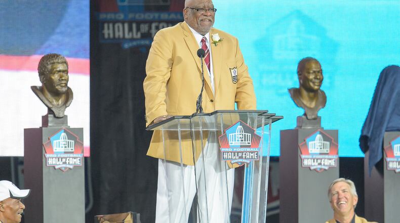 Former NFL defensive end Claude Humphrey gives his speech during the NFL Class of 2014 Pro Football Hall of Fame Enshrinement Ceremony at Fawcett Stadium on August 2, 2014 in Canton, Ohio. (Photo by Jason Miller/Getty Images)